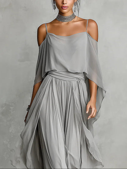 Conjunto elegante gris de blusa de gasa descubierta de los hombros y pantalones de pierna ancha