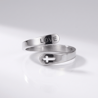 El anillo de la compasión — Cruz con detalle de amor (ajustable)