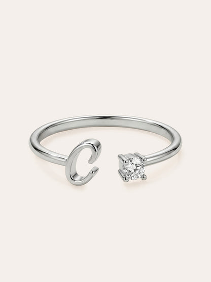 Valentia – Anillo con letra y circonitas