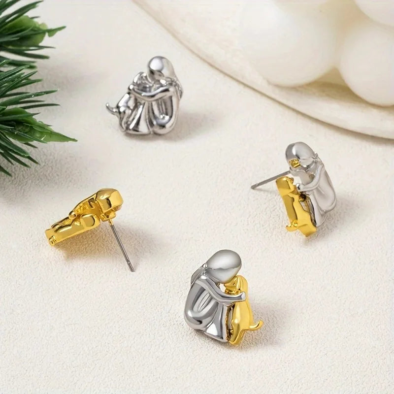 Los aretes Hug — plata y
