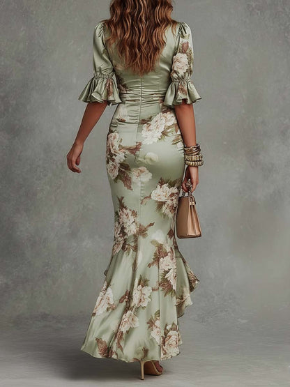 Vestido largo asimétrico de satén floral con mangas acampanadas de volantes